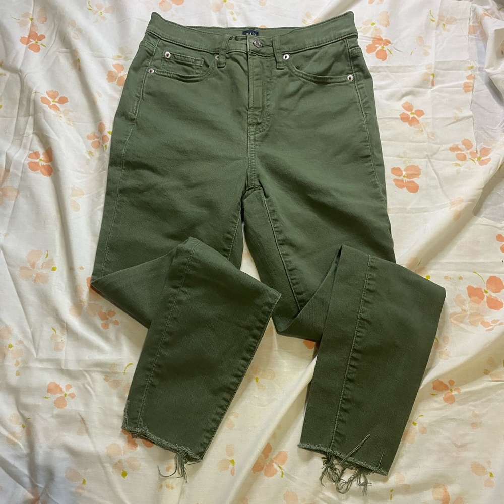 Green cut bottom skinny jeans